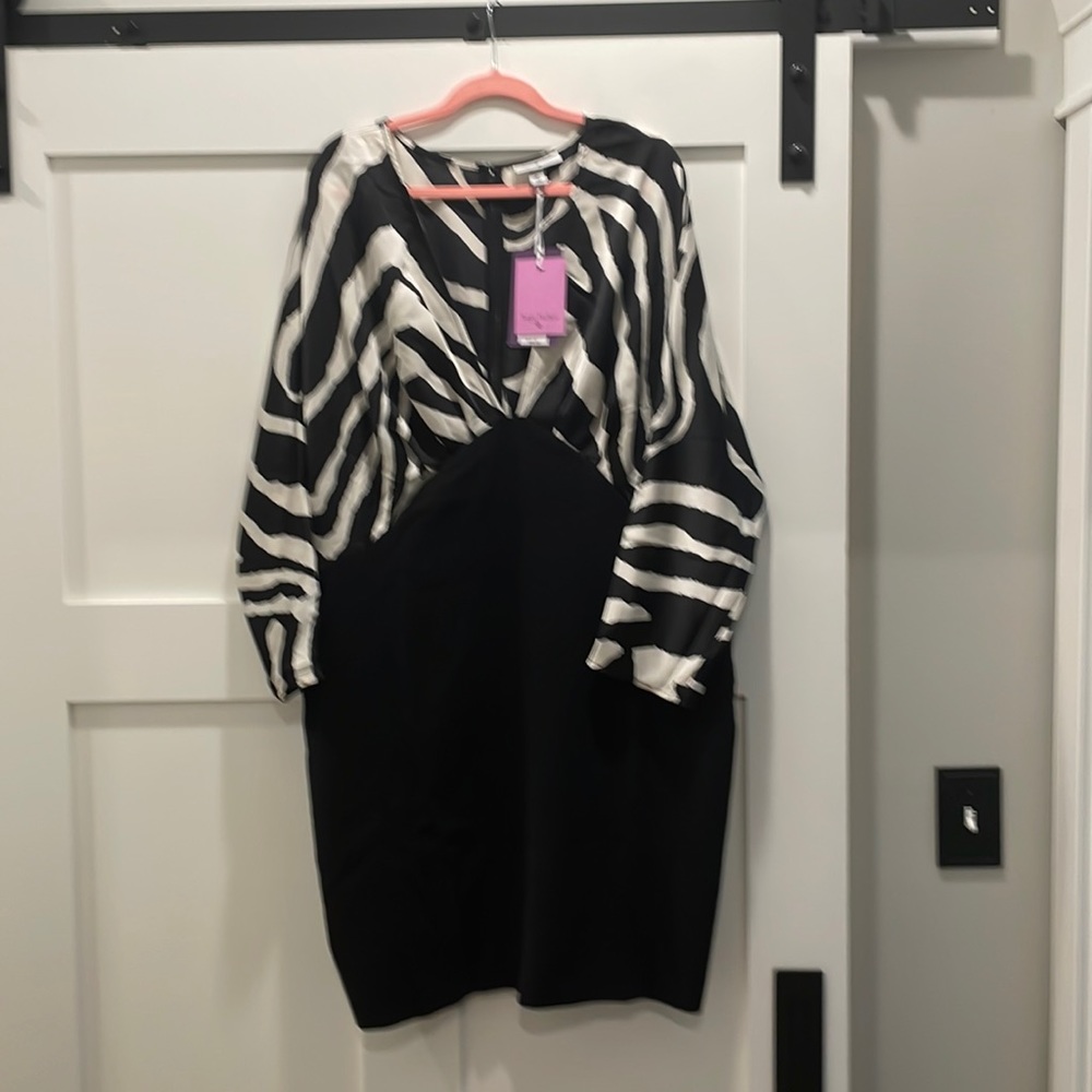 Black and zebra print dress. 3/4 sleeve. Knee length. New with tags. 2X